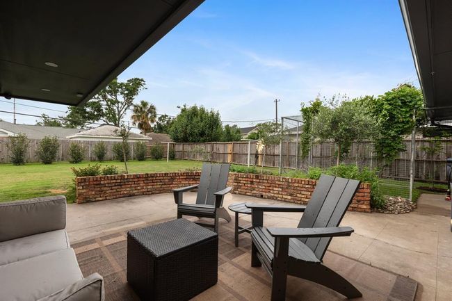 The back yard patio is a great place to enjoy your coffee or hang out. | Image 16