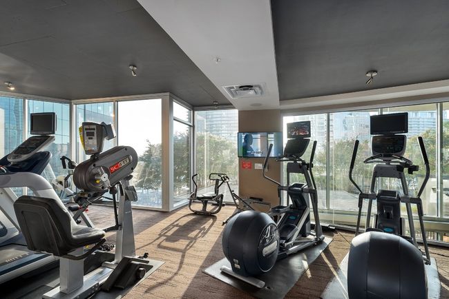 Exercise room with floor to ceiling windows | Image 22