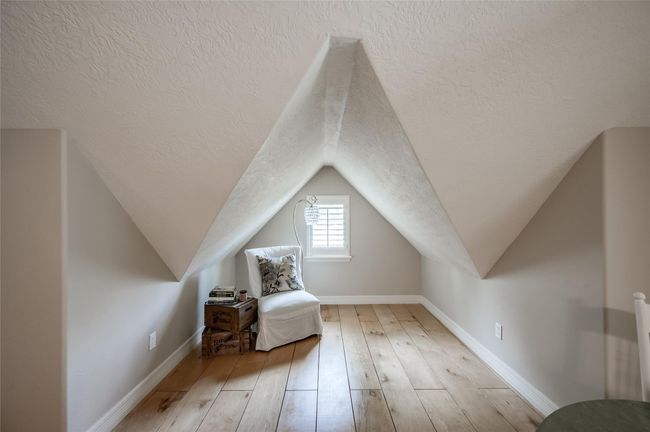This serene meditation and reading nook offers cozy versatility, having previously accommodated a queen-size bed. | Image 29