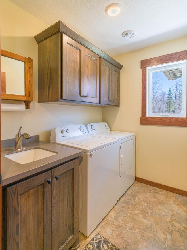 Laundry room with utility sink | Image 16