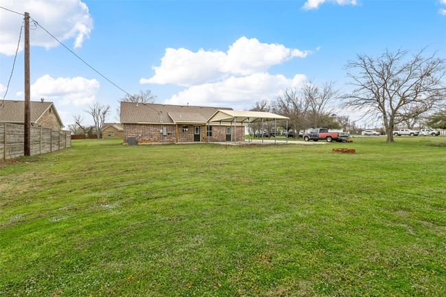 View of yard featuring fence | Image 19