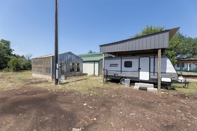 View of outbuilding featuring a carport | Image 33