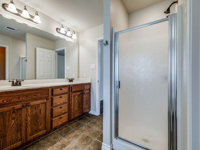 Primary bathroom with separate shower and dual sinks | Image 24