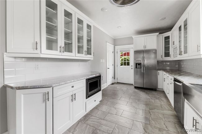 custom cabinets, built-in microwave, pantry | Image 14