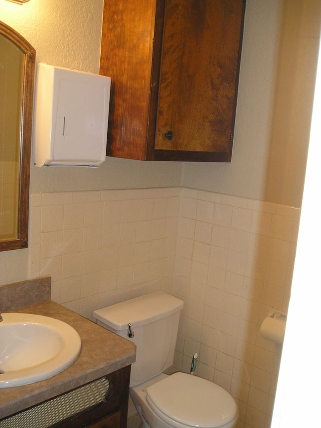 Spare room with a drop ceiling and carpet floors | Image 7