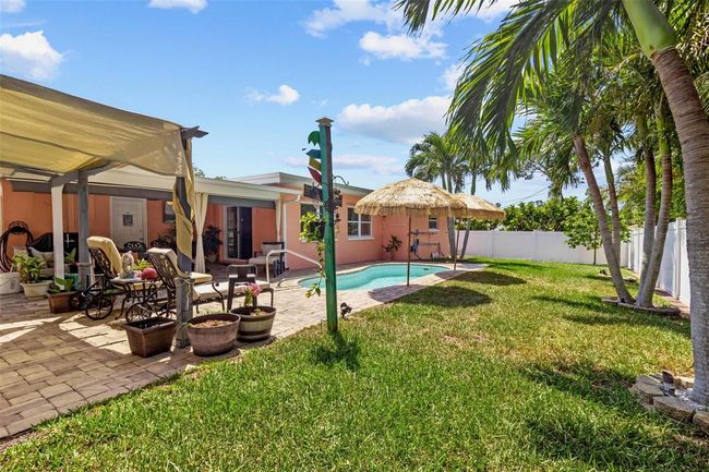 Lots of green space with pool and covered areas! | Image 30
