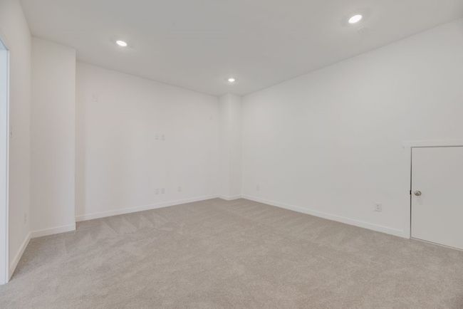 Unfurnished room featuring light carpet and recessed lighting | Image 15