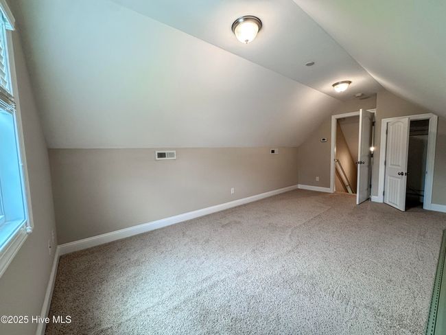 4th bedrooms is a furnished room over the garage. Has own thermostat in room. Access to attic is through the closet. | Image 14