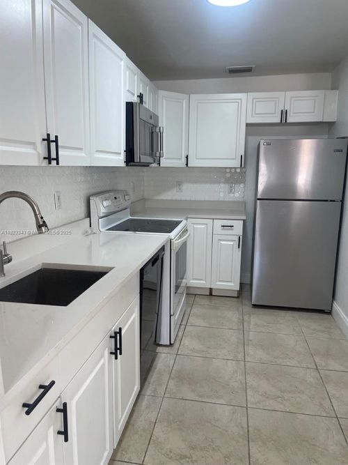 front-2329 Ne 173rd St, North Miami Beach, FL, 33160-4887 | Card Image
