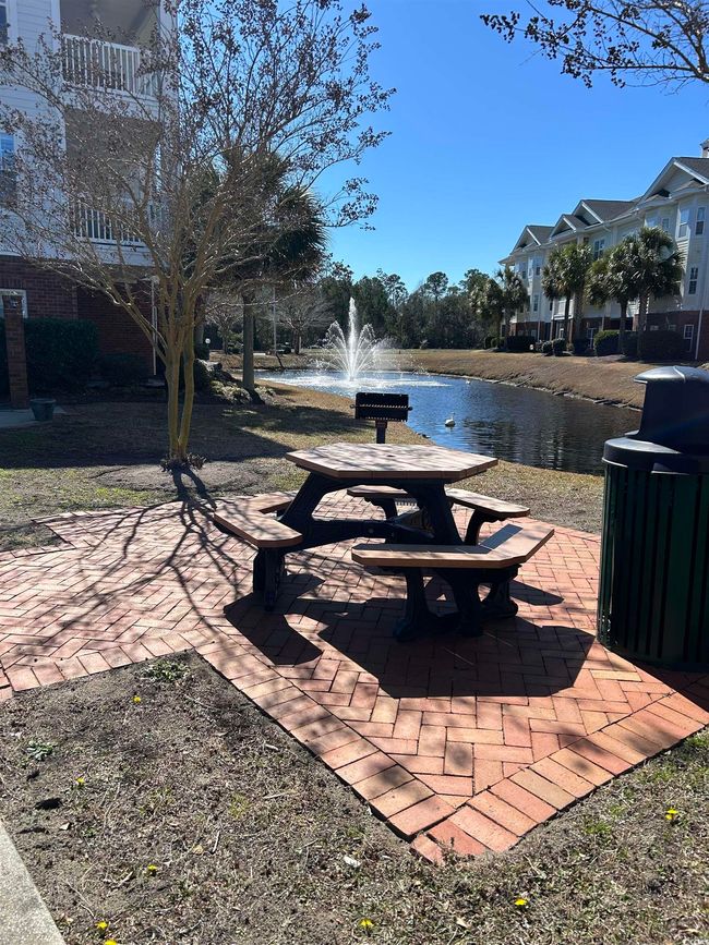 Exterior space featuring a water view and a patio | Image 19
