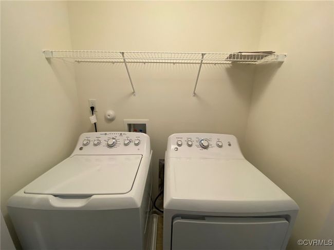 Washroom featuring washing machine and dryer | Image 14
