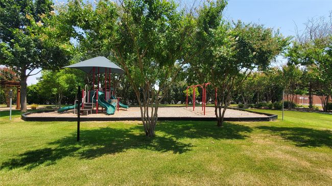 Well manicured HOA maintained private park and Playgrounds. | Image 18