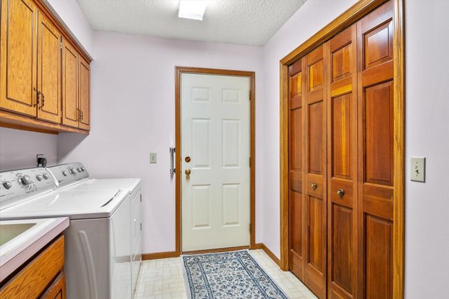 Mud/laundry room off of the garage. Complete with a sink too :-) | Image 18