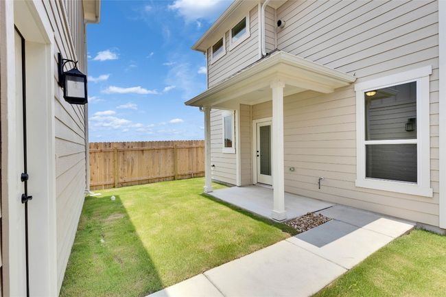 View of yard with a patio area | Image 13