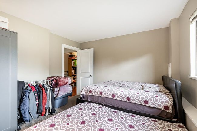 Bedroom with carpet flooring | Image 27