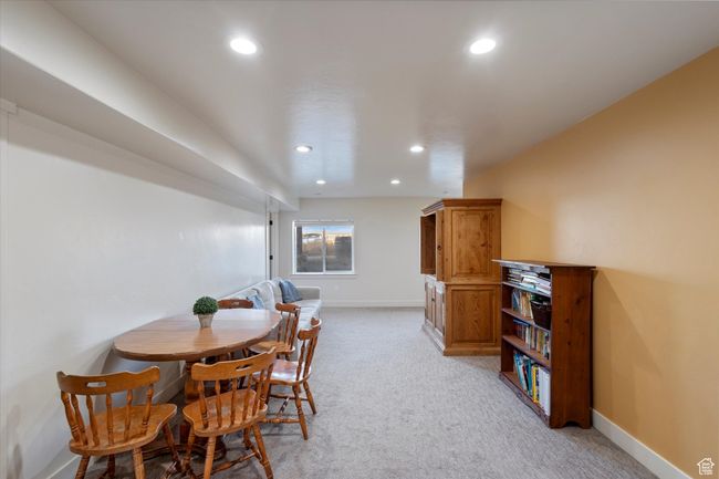 Dining area featuring recessed lighting, baseboards, and light colored carpet | Image 30