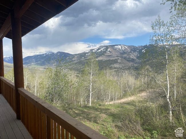 Mountain view featuring a forest | Image 16