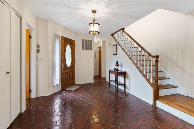 Foyer with tiled floors | Image 4
