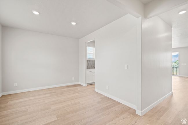 Spare room featuring light wood finished floors, recessed lighting, and baseboards | Image 21