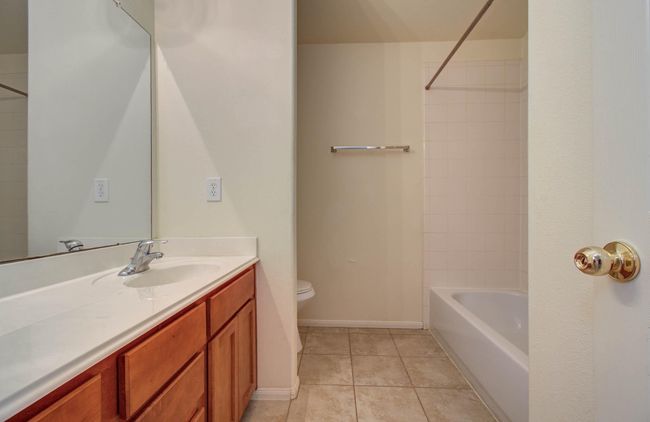 Hall bathroom has a shower/tub combo with easy access from all the bedrooms/gameroom. | Image 28