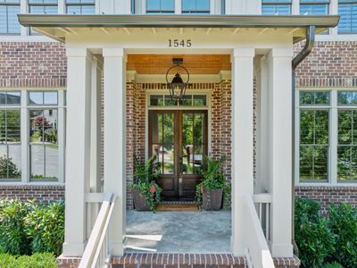 Let this beautiful entry welcome your friends. Notice the wood ceiling and gas lantern. (roof and gutters were replaced in 2024) | Image 3