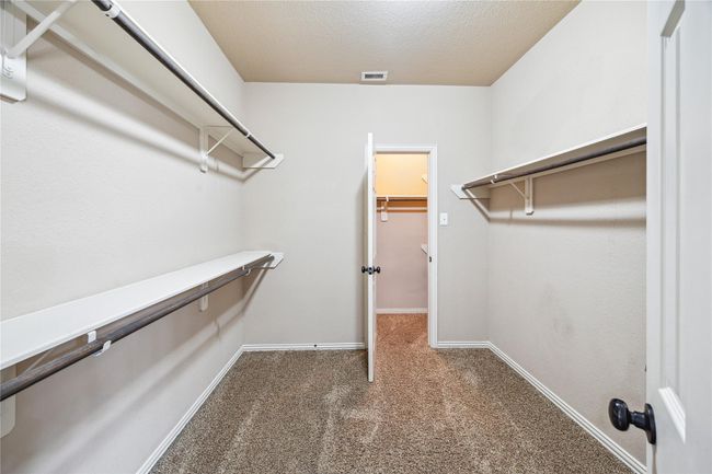 Two walk in closets in primary bedroom! | Image 17