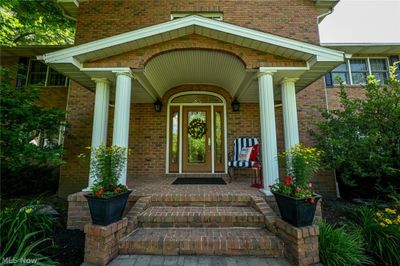 Property entrance featuring covered porch | Image 3