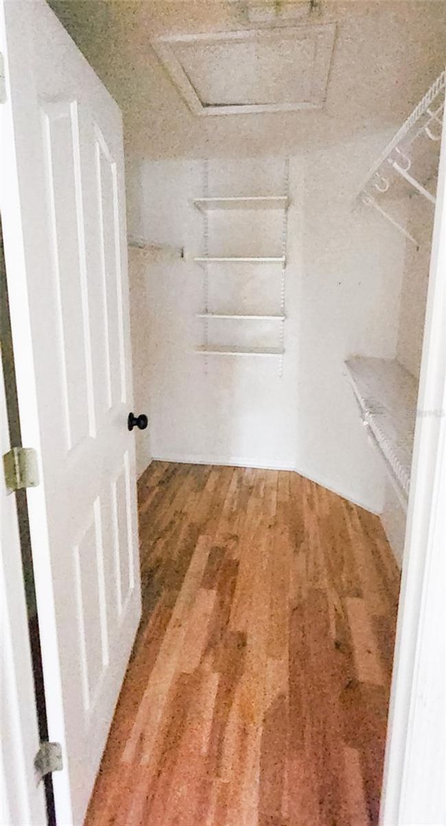 Primary walk in closet | Image 10