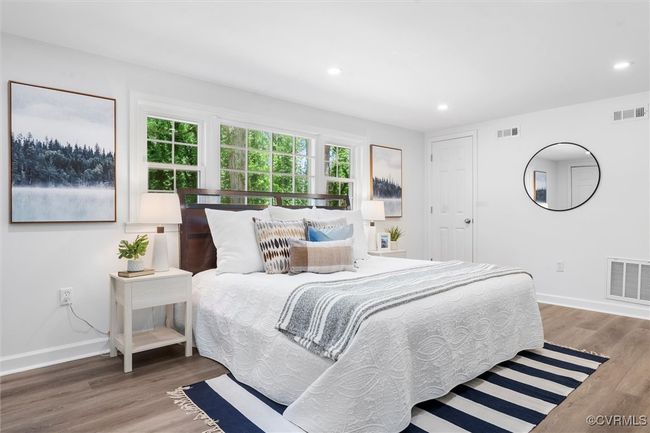 Primary en suite on lower level - 2 closets and a walk in closet off of bathroom | Image 28