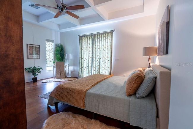 The third bedroom also includes a private en-suite bath and showcases stunning views adding comfort and beauty to this serene space. | Image 46
