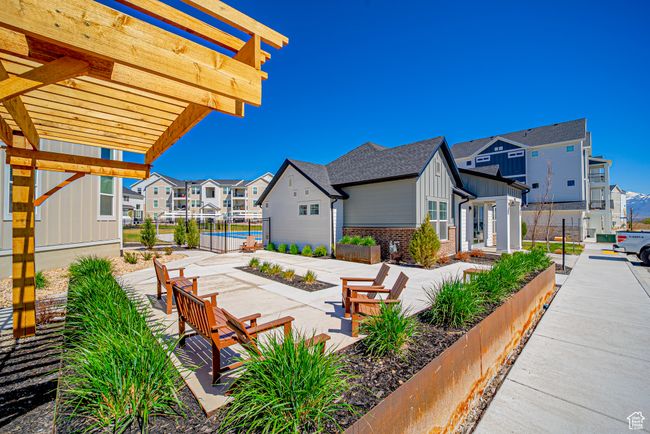 View of patio / terrace with a pergola, fence, and a residential view | Image 26