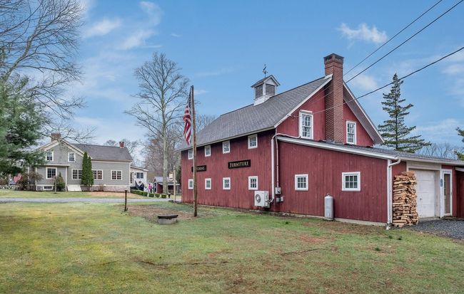 garage door located at end of barn | Image 33