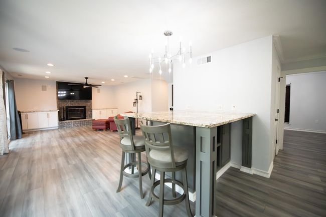 Breakfast bar and living room | Image 17