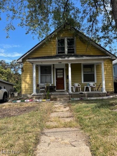 Bungalow-style house with covered porch | Image 1