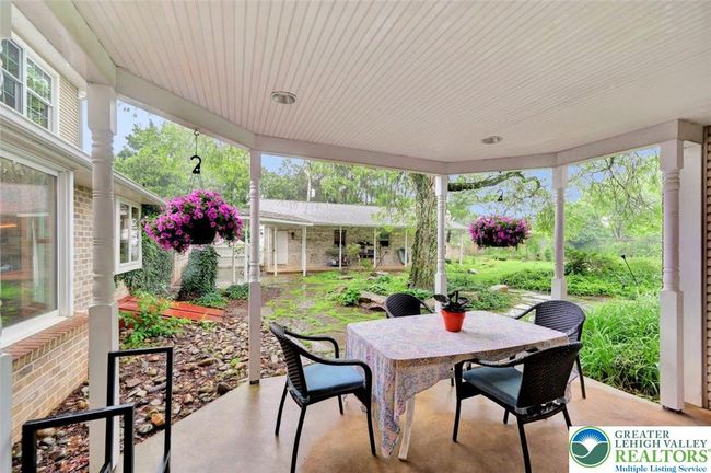 covered patio off family room | Image 18