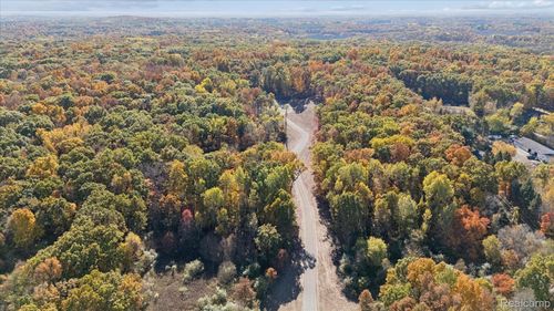 4 Coon Lake Rd, Genoa Township, MI, 48843 | Card Image