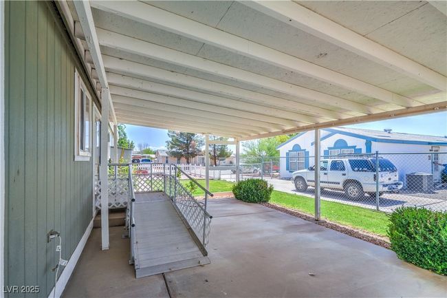 View of patio / terrace with a residential view | Image 31