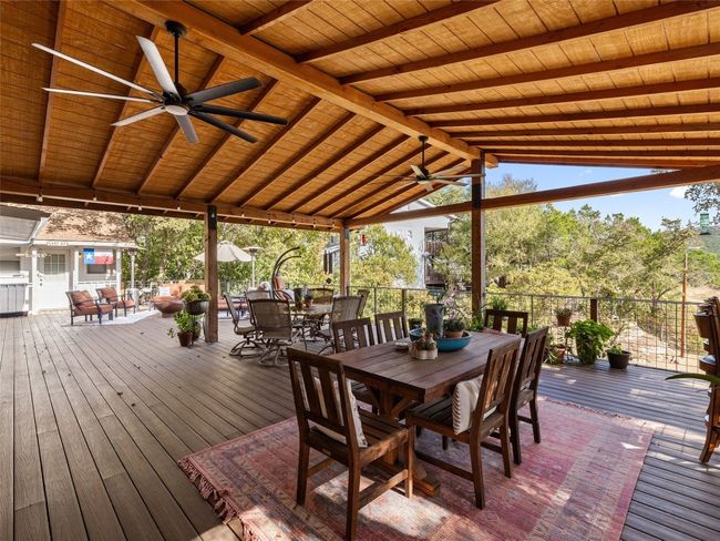 Back patio is fabulous for relaxing or entertaining a large group. | Image 37