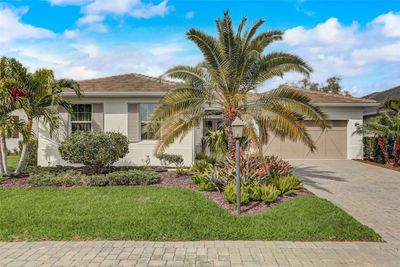 7725 Sandhill Lake Drive, House other with 3 bedrooms, 3 bathrooms and null parking in Sarasota FL | Image 2