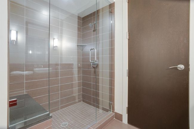 Bathroom with a shower stall | Image 28