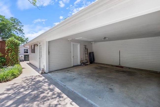 Garage featuring an attached carport | Image 29