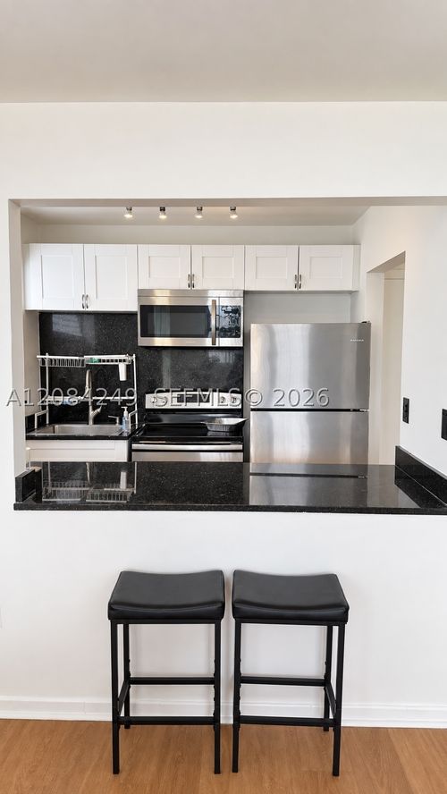 407-1990 Marseille Dr, Miami Beach, FL, 33141-6403 | Card Image