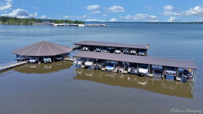 View of dock with a water view and boat lift | Image 39