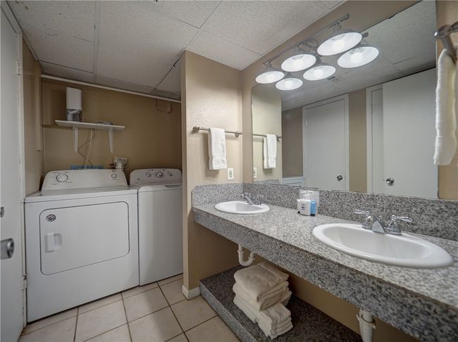 Primary Bathroom and washer and dryer for your guests | Image 19