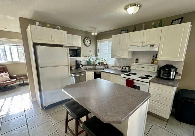 201 - 5220 50 A Avenue, Townhouse with 3 bedrooms, 2 bathrooms and 1 parking in Sylvan Lake AB | Image 16