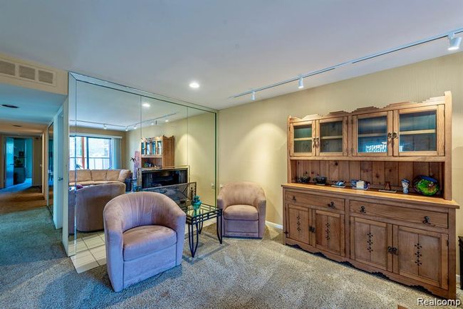 Sitting room featuring track lighting and carpet flooring | Image 10