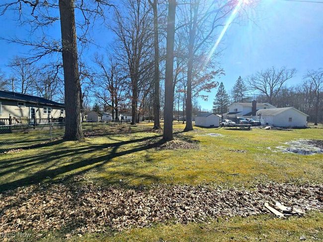 View of yard with fence | Image 11