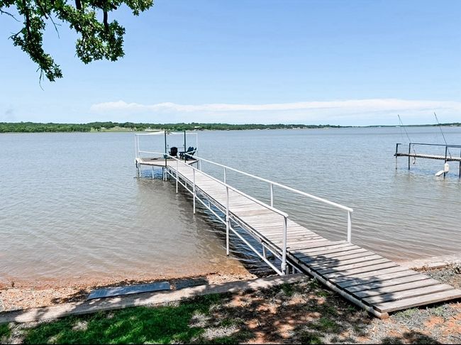 Updated dock with new decking and soft covering | Image 35