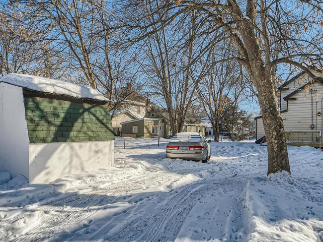 395 Charles Saint Paul 55103... Backyard offers off-street parking & storage shed. Room for future 2 car garage | Image 11