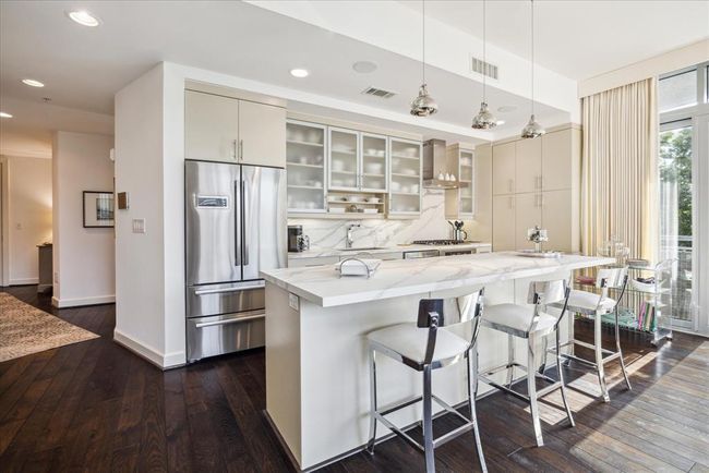 Another view of the kitchen. | Image 11